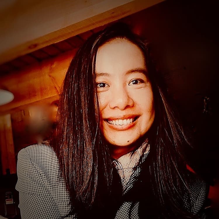 Elle Yuan Wang